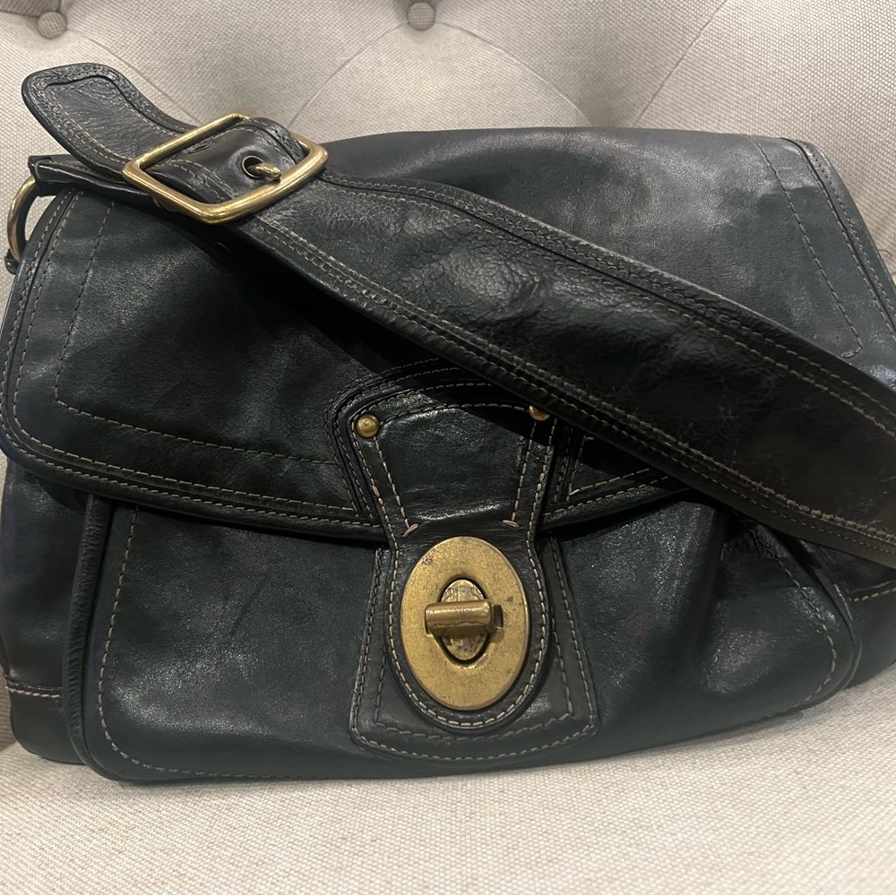 Vintage Coach leather “baseball mitt” handbag.